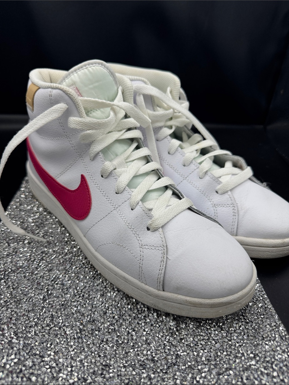 Nike White High-Top Sneakers with Pink Swoosh